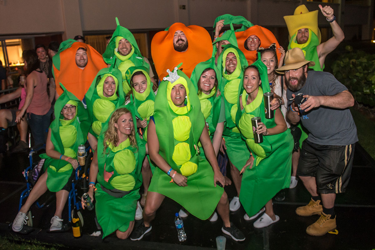 A group photo of guests in matching theme night costumes.