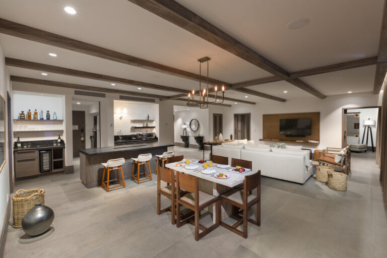 Living room and kitchen area of a Villa suite.