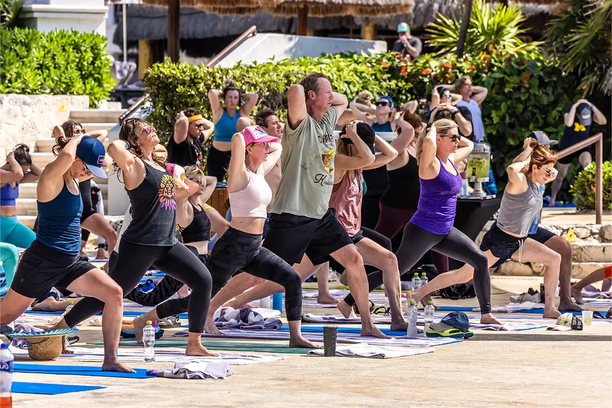 Guests participating in a morning group yoga session.